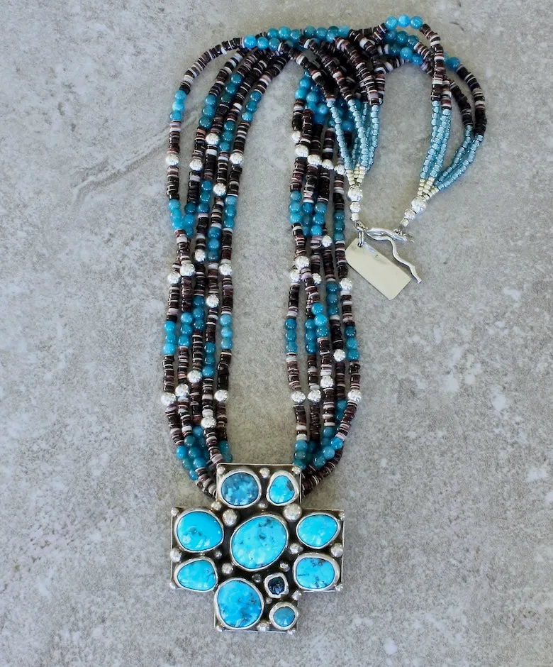 10-Stone Castle Dome Turquoise and Sterling Silver Pendant with 5 Strands of Apatite, Olive Shell Heishi and Sterling Silver