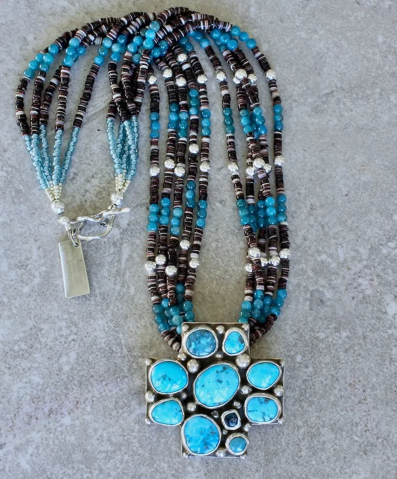 10-Stone Castle Dome Turquoise and Sterling Silver Pendant with 5 Strands of Apatite, Olive Shell Heishi and Sterling Silver