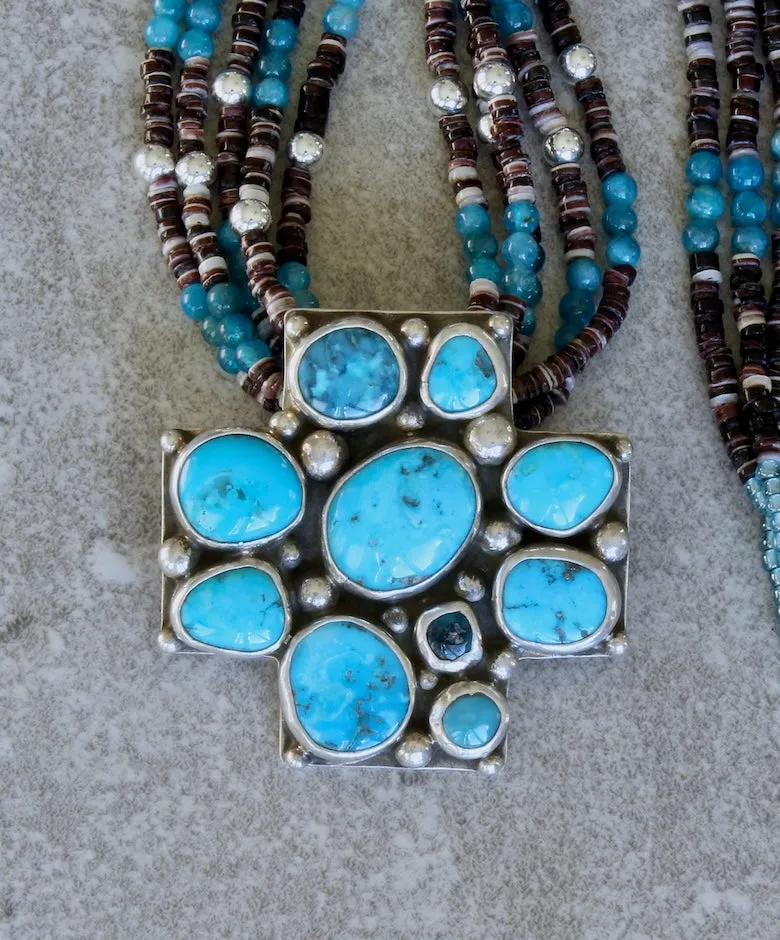 10-Stone Castle Dome Turquoise and Sterling Silver Pendant with 5 Strands of Apatite, Olive Shell Heishi and Sterling Silver