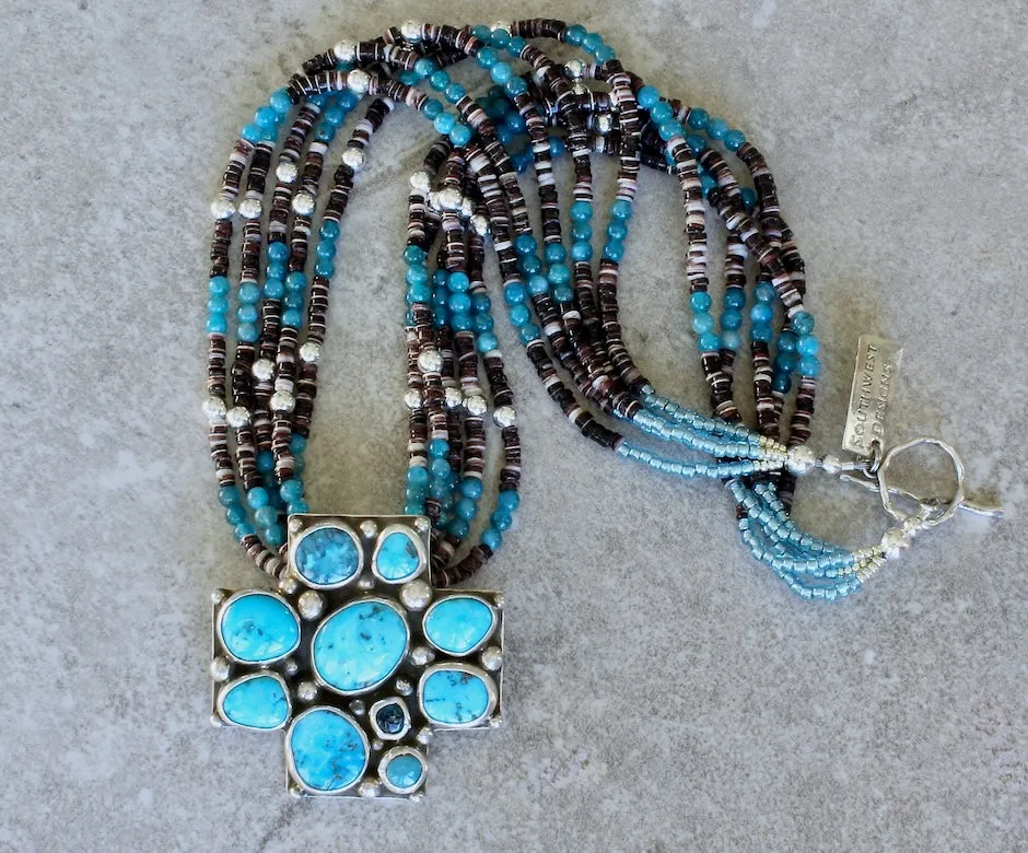 10-Stone Castle Dome Turquoise and Sterling Silver Pendant with 5 Strands of Apatite, Olive Shell Heishi and Sterling Silver