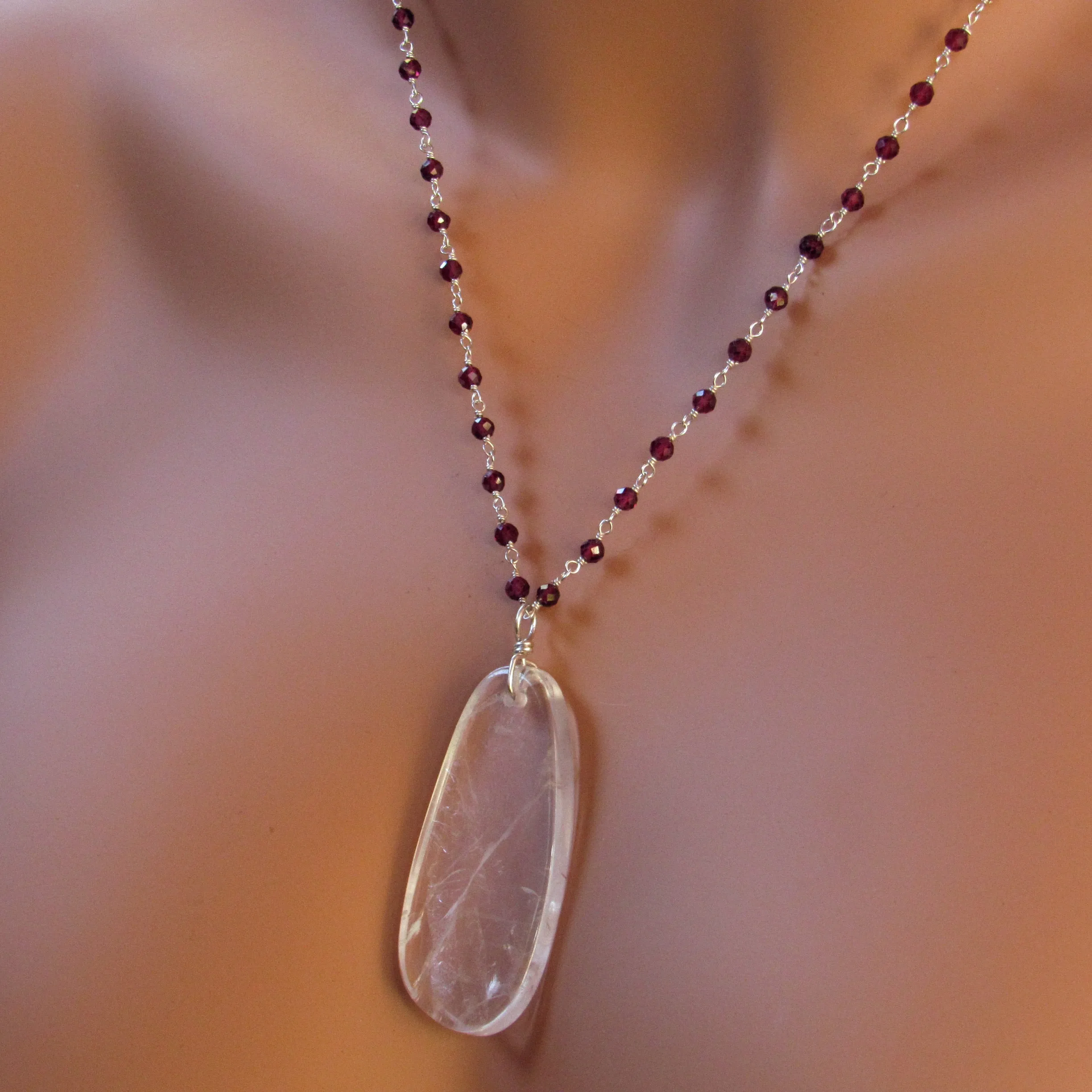 Clear Quartz Gemstone on Wrapped Garnets and Sterling Silver Necklace