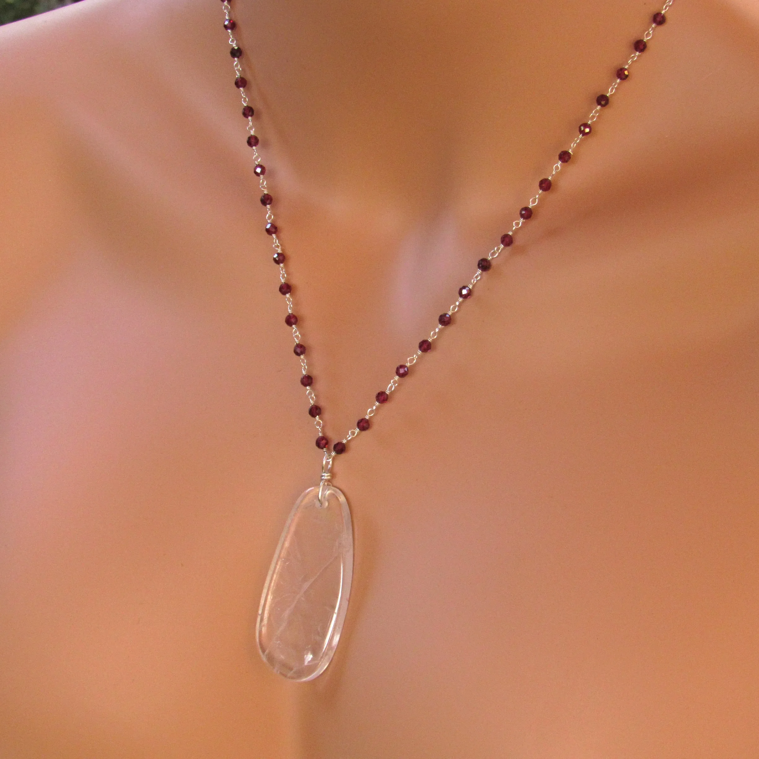 Clear Quartz Gemstone on Wrapped Garnets and Sterling Silver Necklace