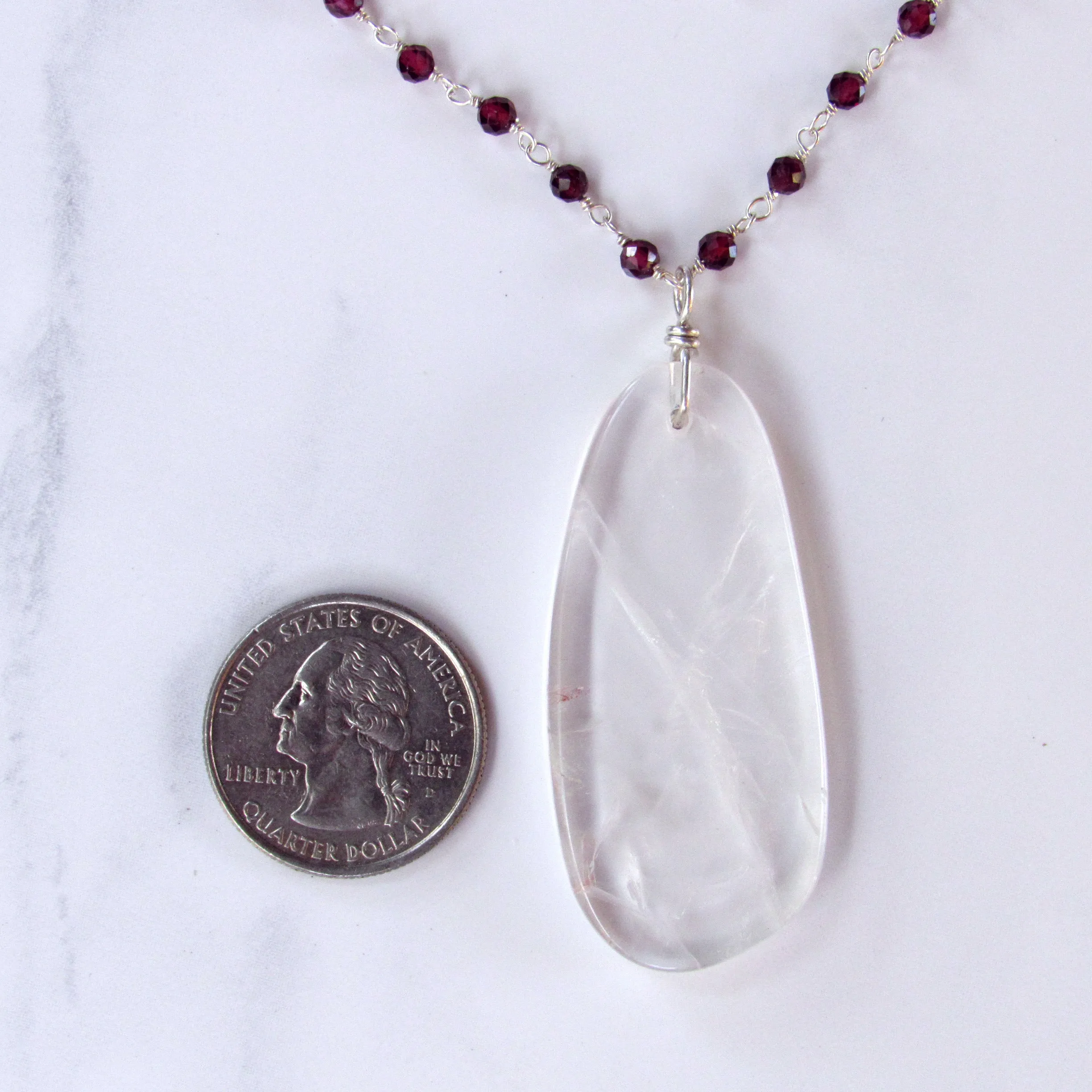 Clear Quartz Gemstone on Wrapped Garnets and Sterling Silver Necklace