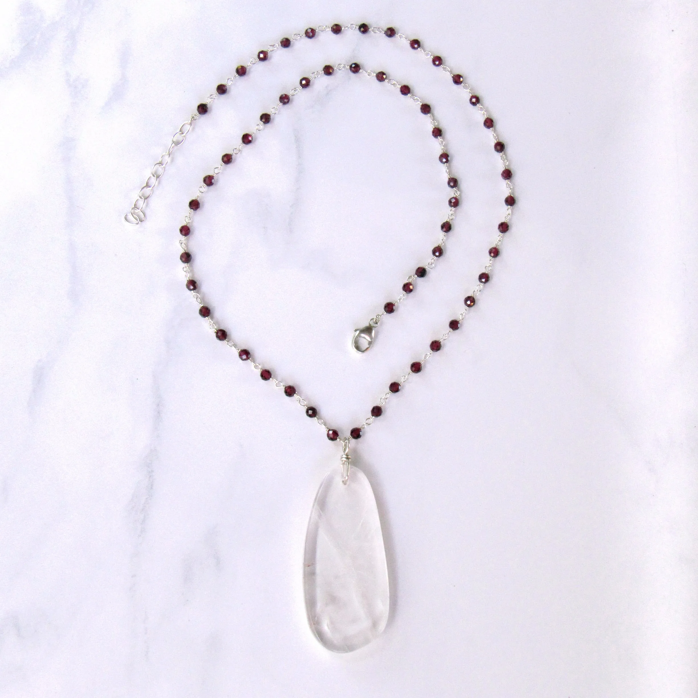 Clear Quartz Gemstone on Wrapped Garnets and Sterling Silver Necklace
