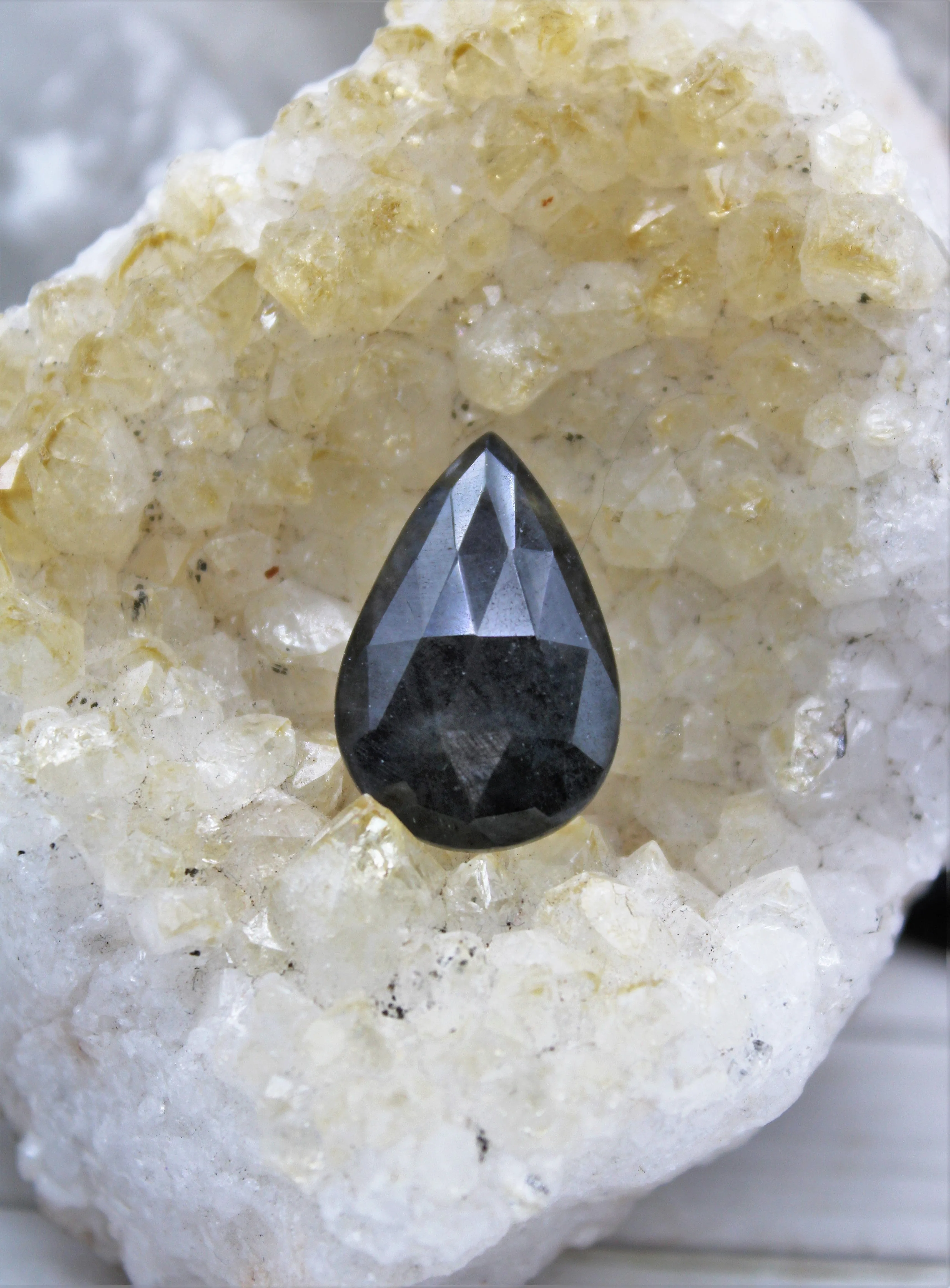 Faceted Eye of Odin Grey/Silver Sapphire Cabochon