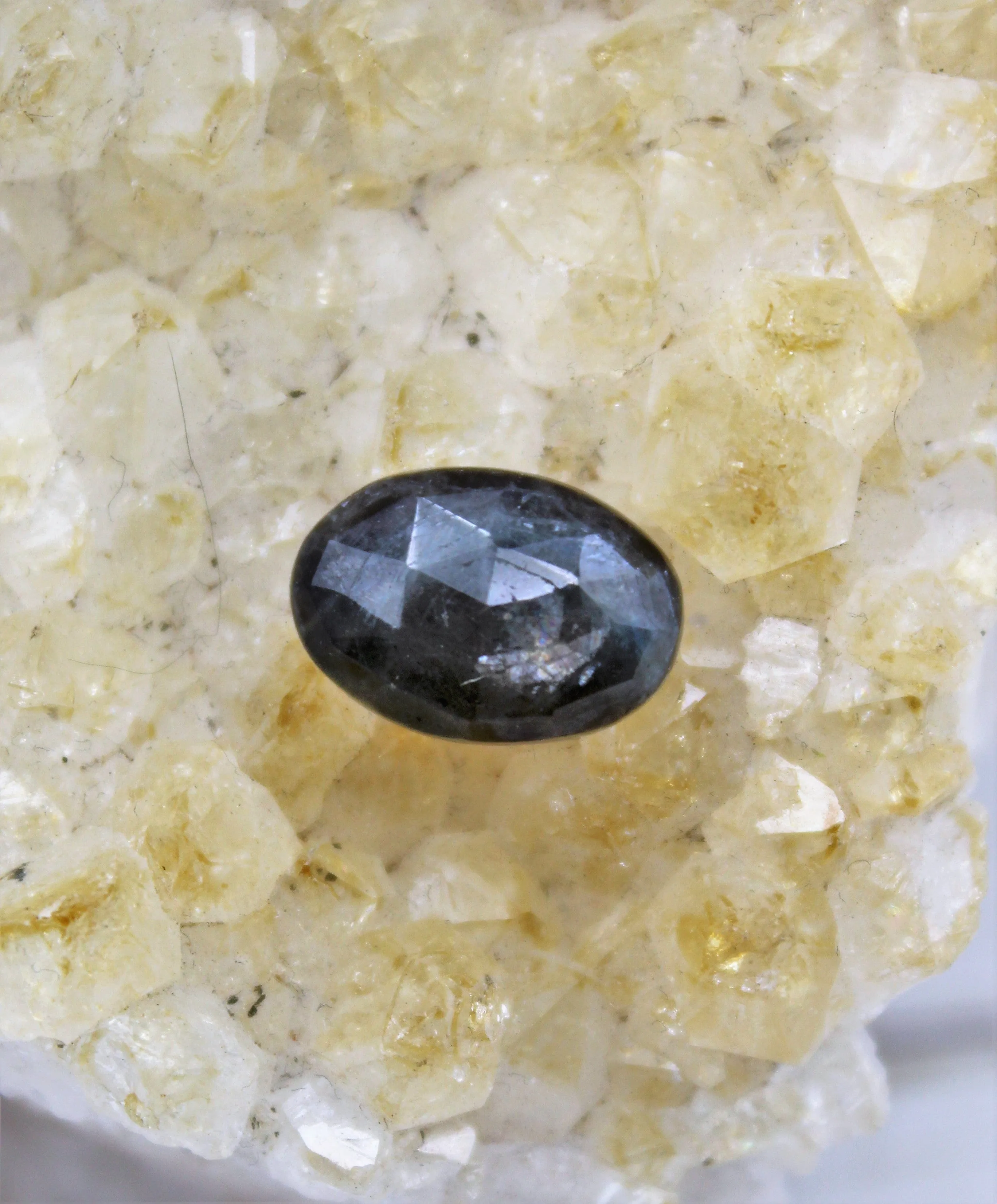 Faceted Eye of Odin Grey/Silver Sapphire Cabochon