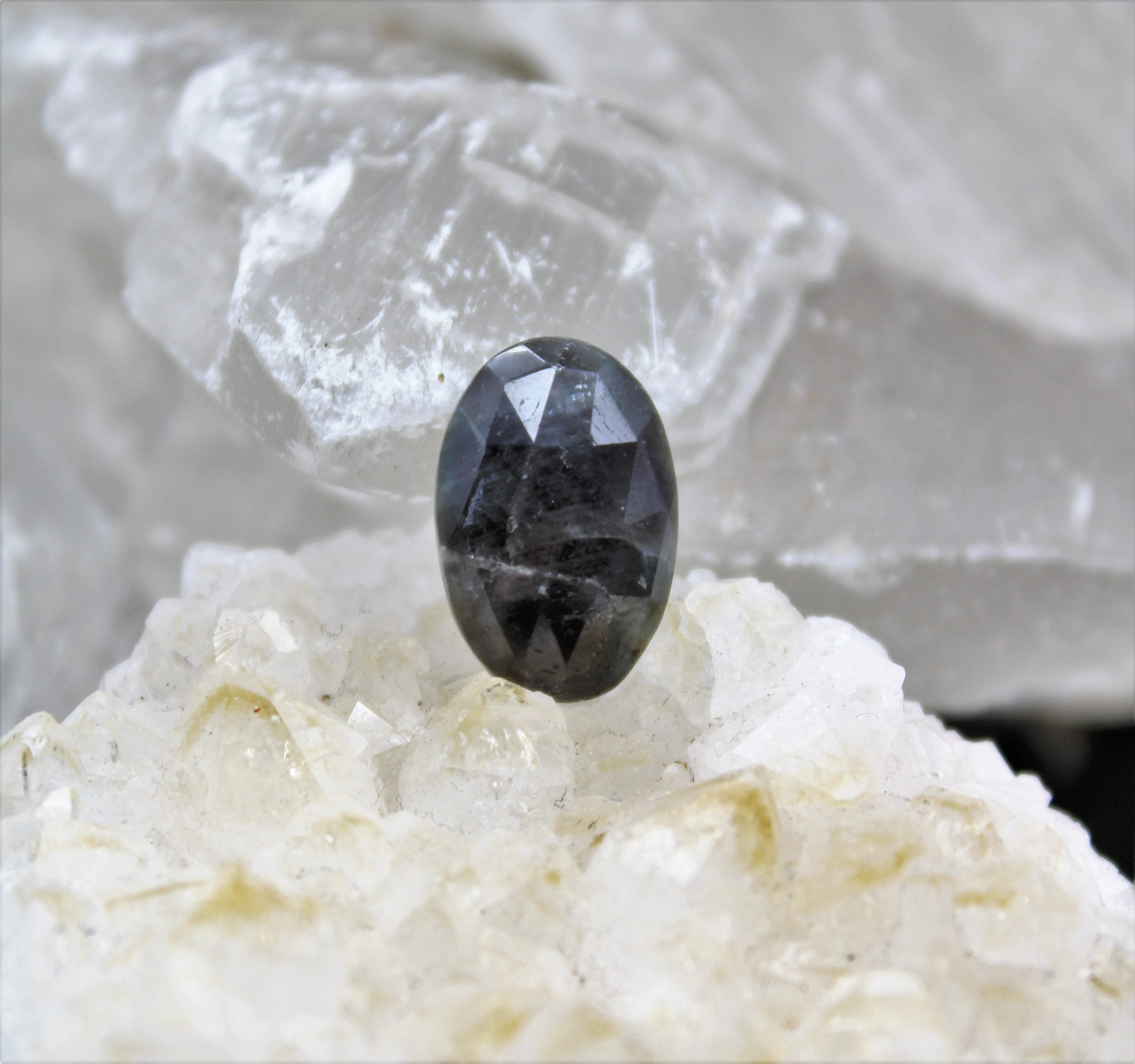 Faceted Eye of Odin Grey/Silver Sapphire Cabochon