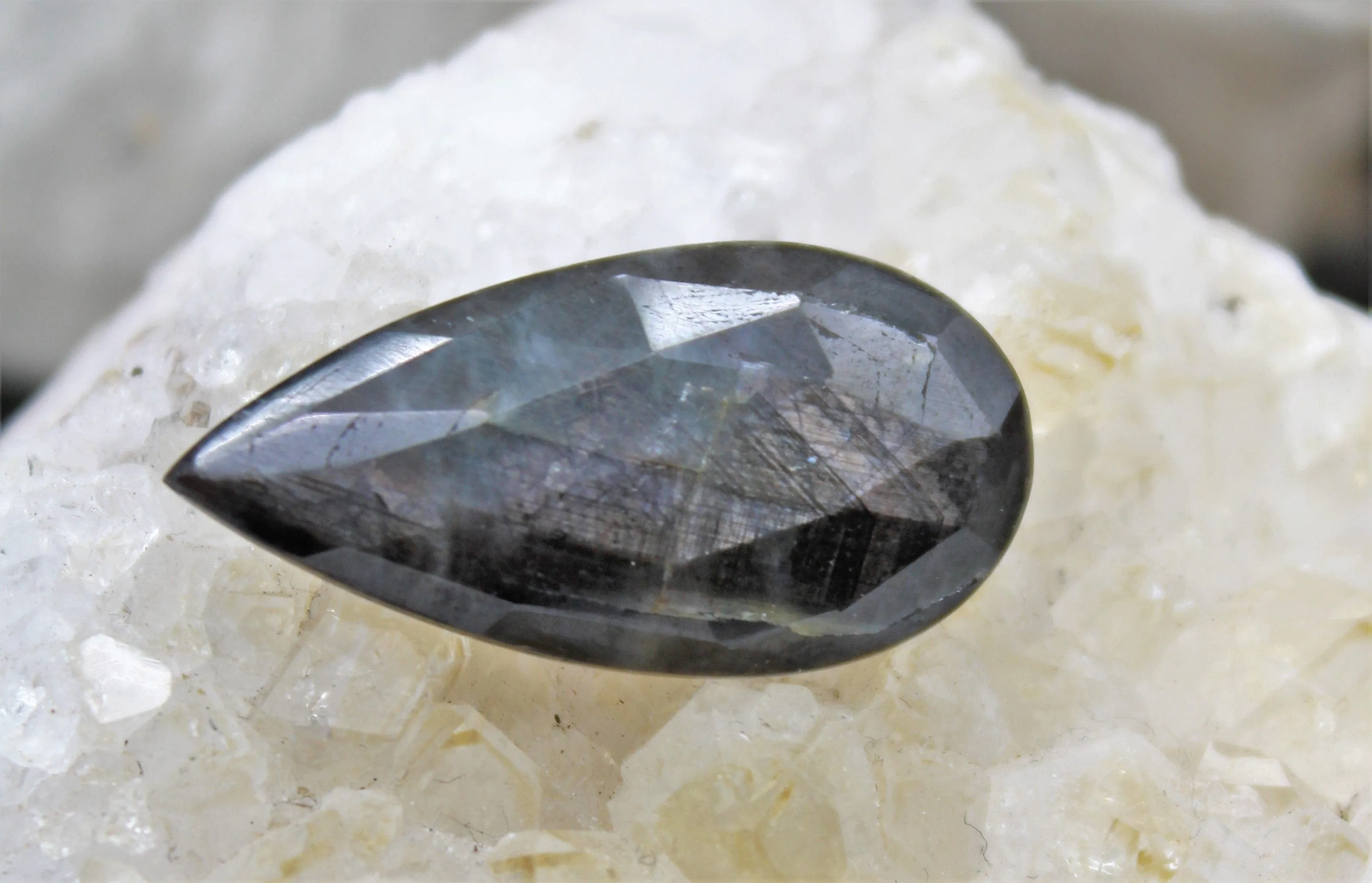 Faceted Eye of Odin Grey/Silver Sapphire Cabochon