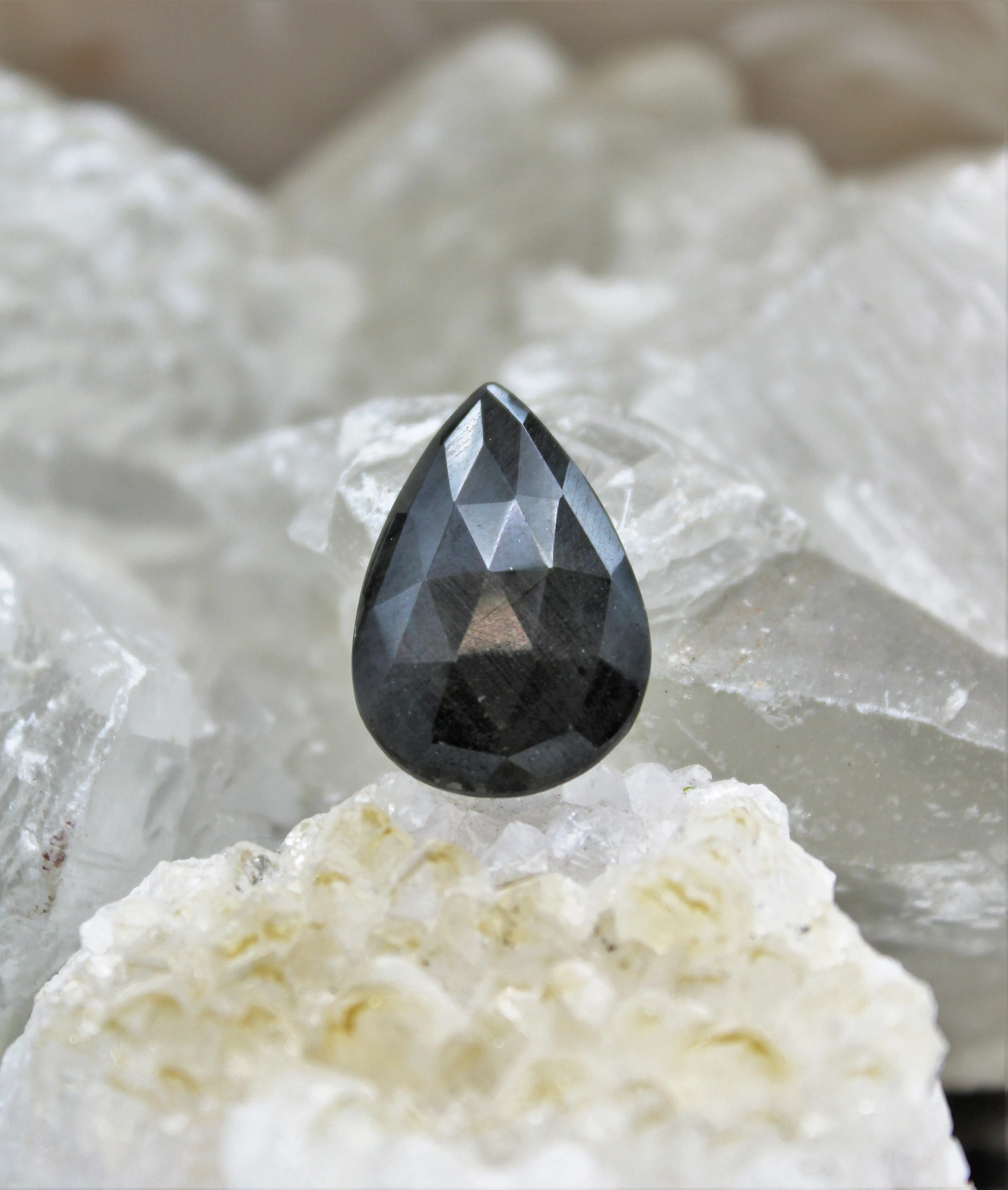 Faceted Eye of Odin Grey/Silver Sapphire Cabochon