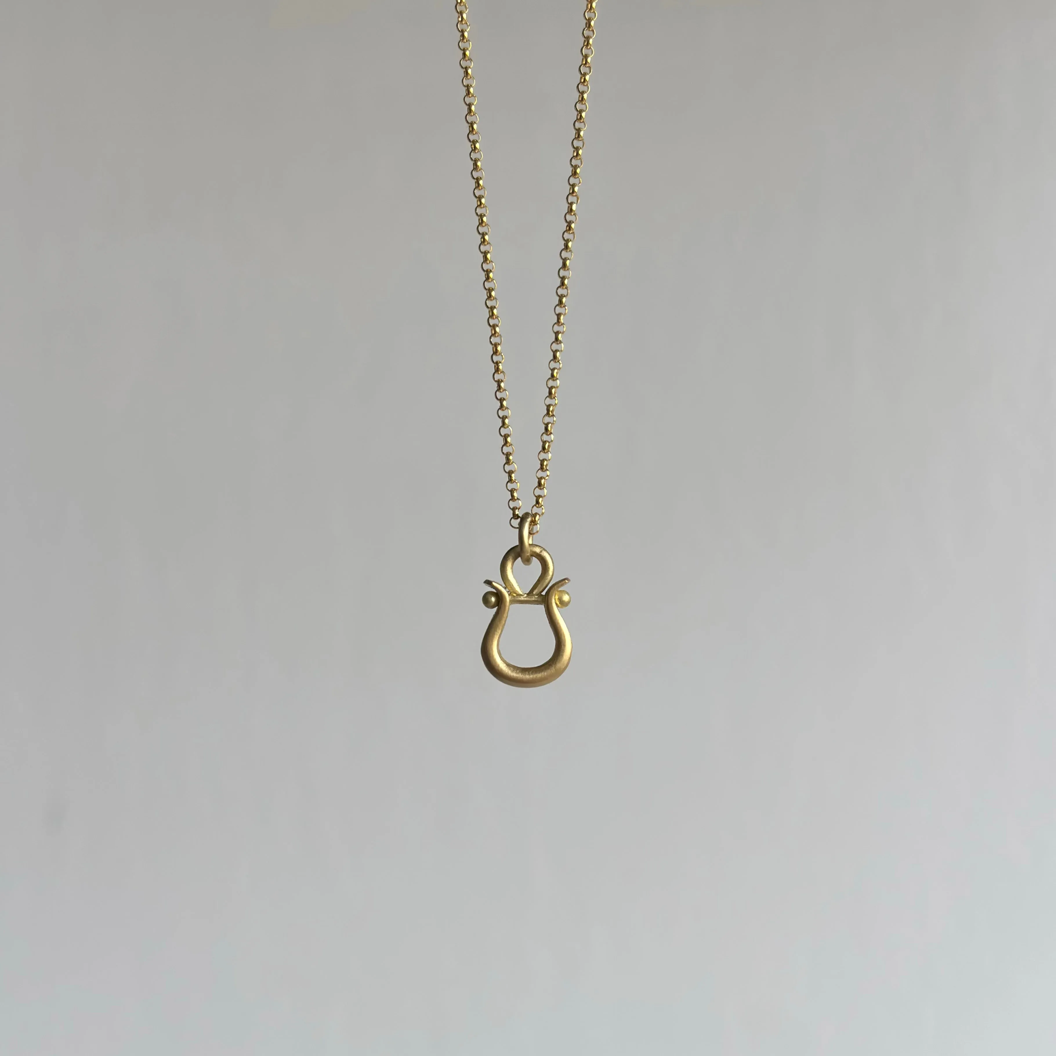 Gold Lyre Pendant