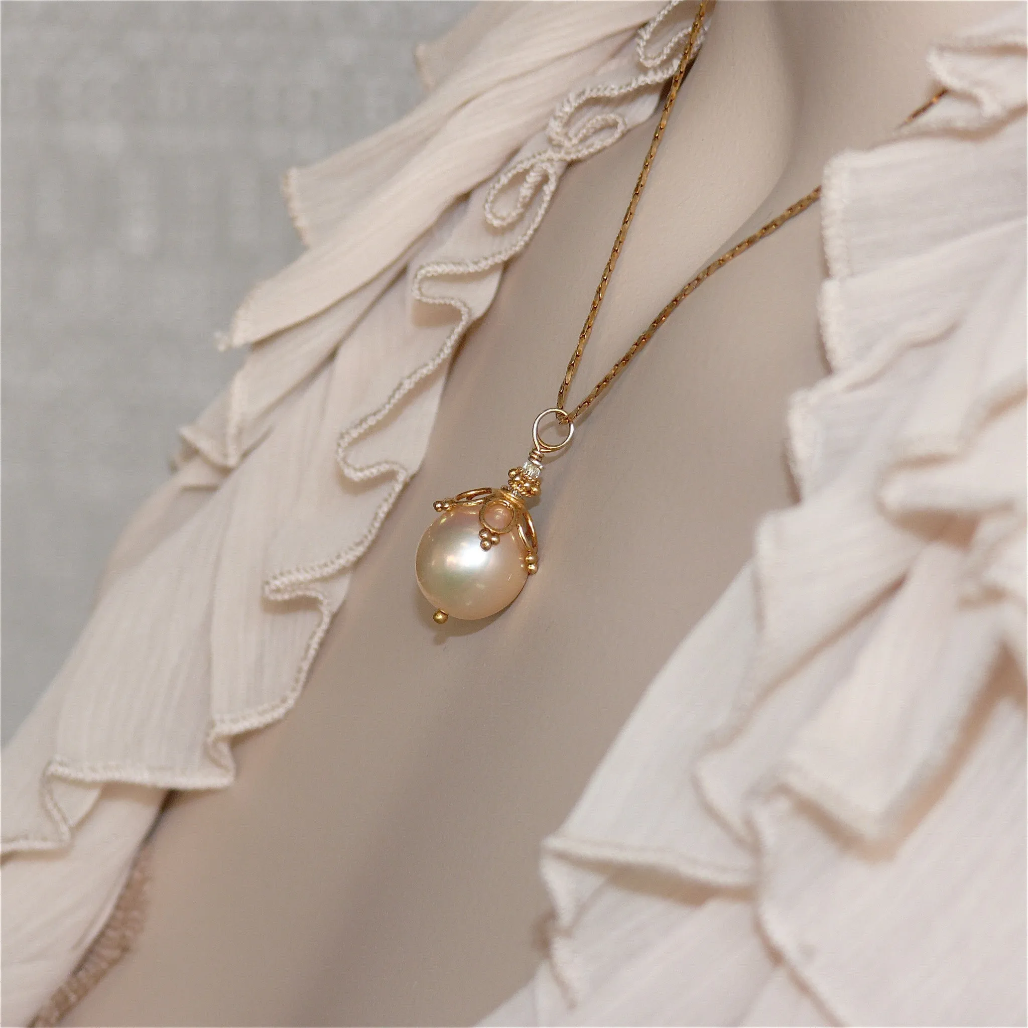 Golden-Peach Plump Pear Pearl Necklace by Arpaia