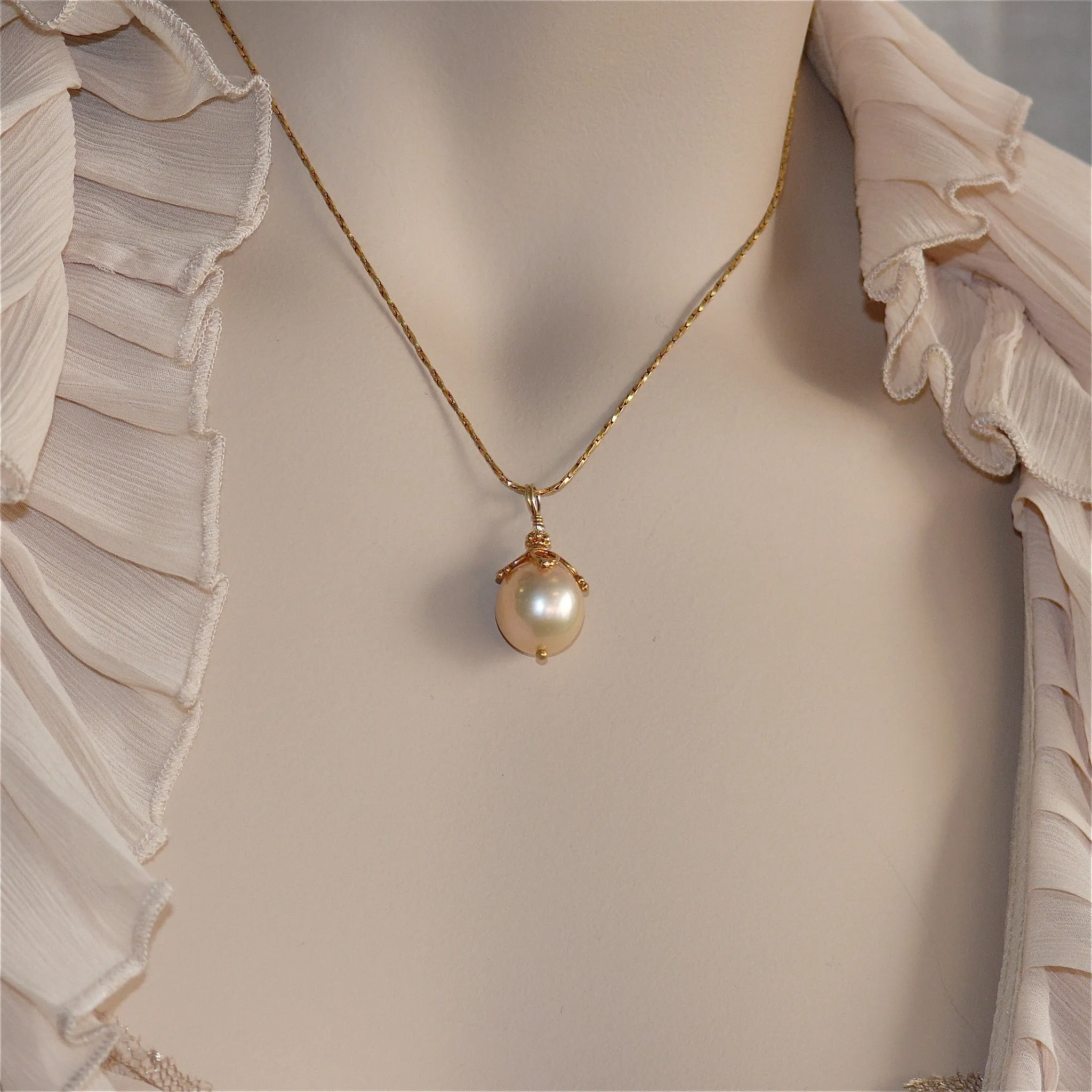 Golden-Peach Plump Pear Pearl Necklace by Arpaia