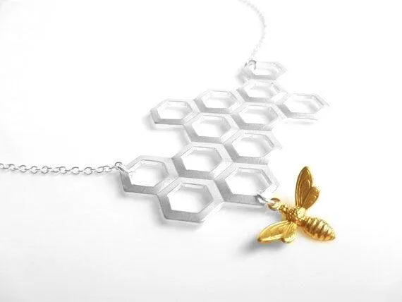 Honeycomb Necklace - gold brass bumblebee dangles from large bee hive pendant in matte silver on simple silver plated chain