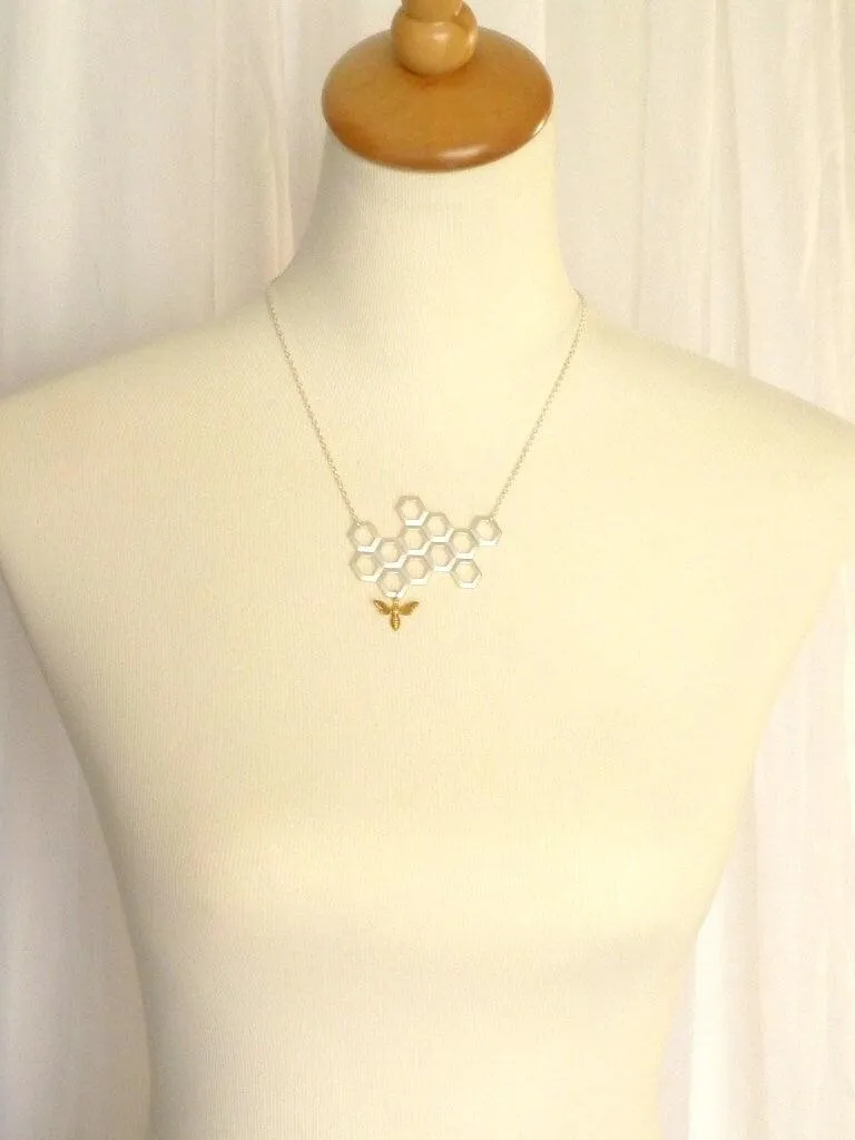 Honeycomb Necklace - gold brass bumblebee dangles from large bee hive pendant in matte silver on simple silver plated chain