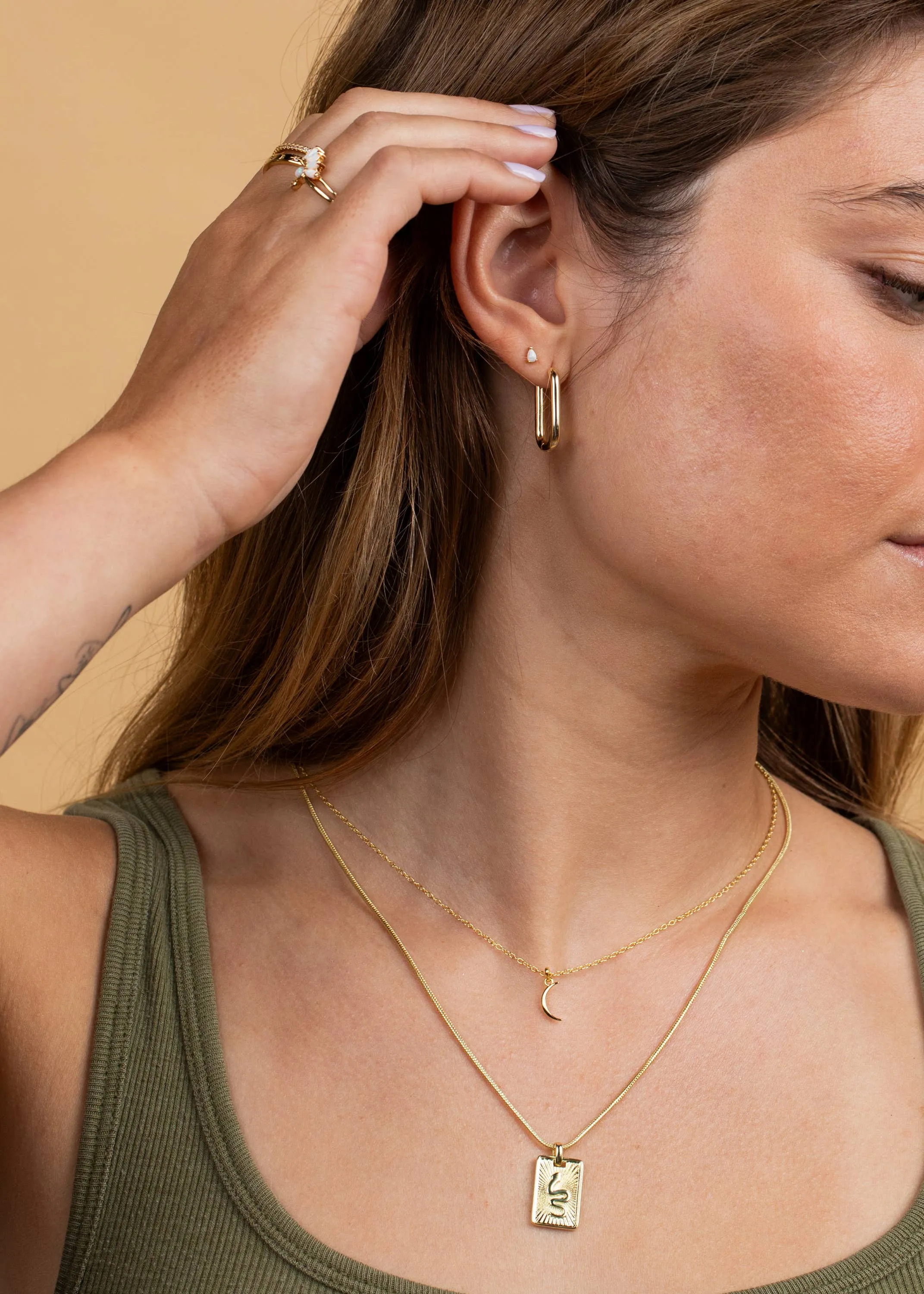 Tiny Crescent Moon Necklace by JaxKelly | Gold
