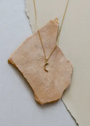 Tiny Crescent Moon Necklace by JaxKelly | Gold