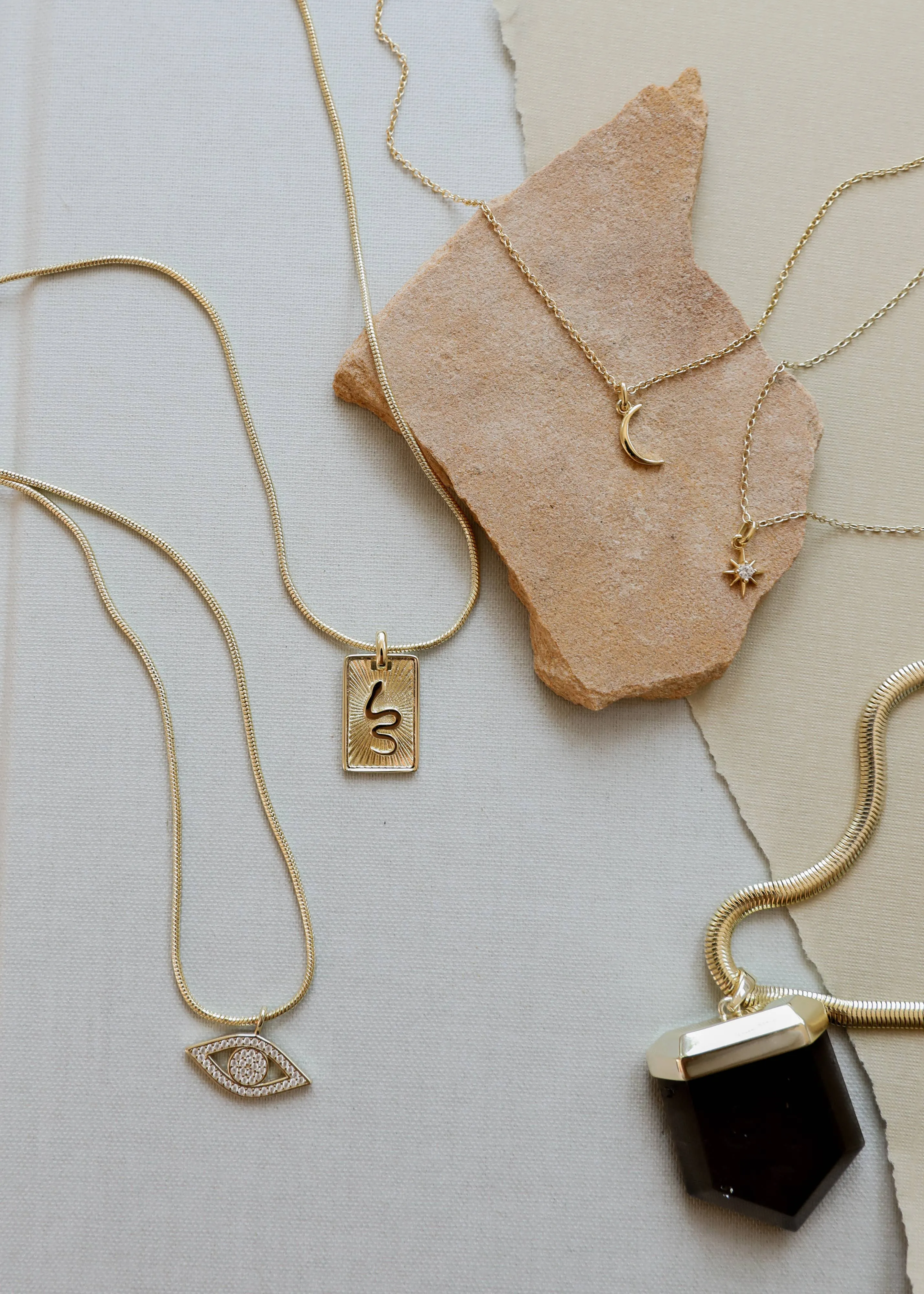Tiny Crescent Moon Necklace by JaxKelly | Gold
